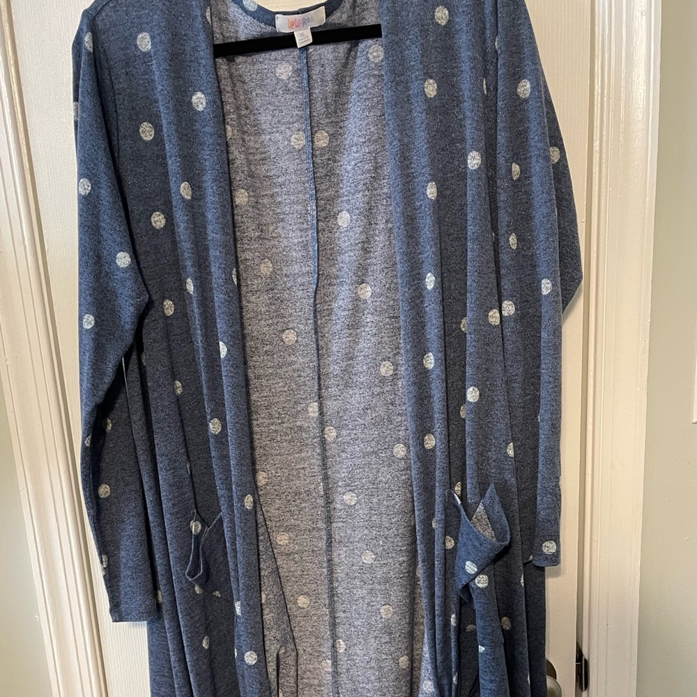 Lularoe long sweater can be tied as seen in picture